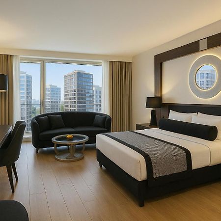 Ramada Hotel & Suites Sisli Стамбул Экстерьер фото